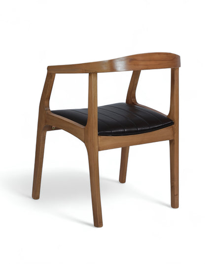 Modern Scandinavian-style dining chair with curved solid wood frame and black upholstered leather seat – ideal for contemporary home interiors, dining rooms, or stylish restaurants
