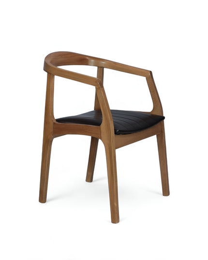 Modern Scandinavian-style dining chair with curved solid wood frame and black upholstered leather seat – ideal for contemporary home interiors, dining rooms, or stylish restaurants