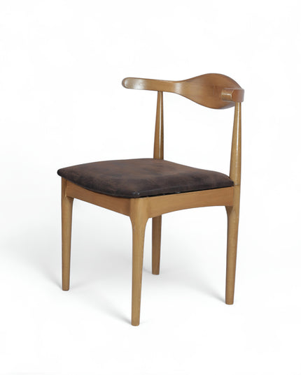 Mid-century modern wooden dining chair with sculpted backrest and brown leather seat cushion — ideal for vintage-inspired interiors, dining rooms, and boutique cafes.