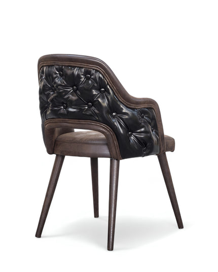 Modern ergonomic accent chair with eco brown leather curved backrest, integrated armrests, and black angled legs