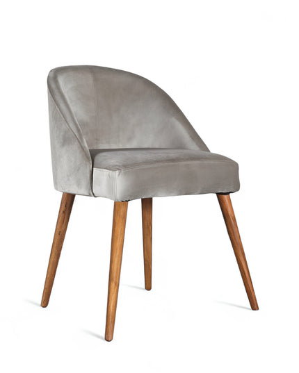 Modern silver velvet dining chair with wooden legs— ideal for contemporary interiors, dining rooms, or statement seating.
