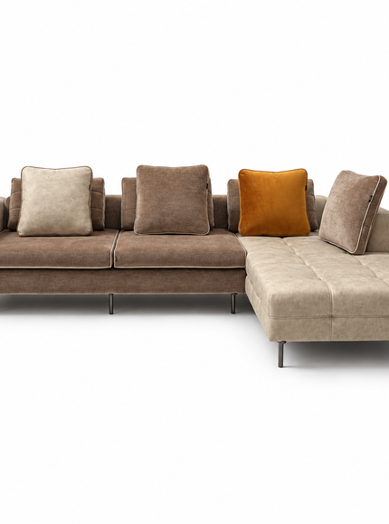 Amberley modern L-shaped sectional sofa with chaise lounge, neutral beige and taupe upholstery, amber accent cushion, included back cushions and slim metal legs.