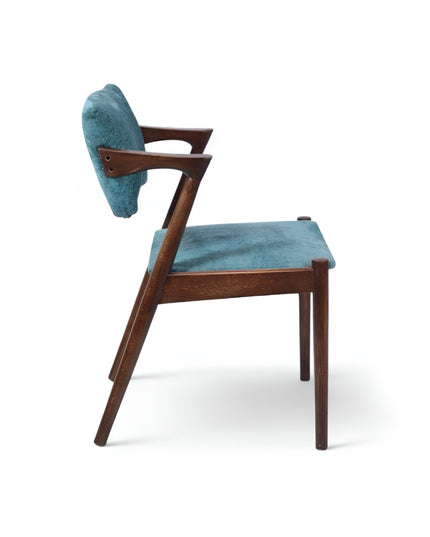 Mid-century modern accent chair with an angular dark wood frame and teal textured upholstery on the seat and backrest, ideal for dining areas, home offices, or stylish living spaces.