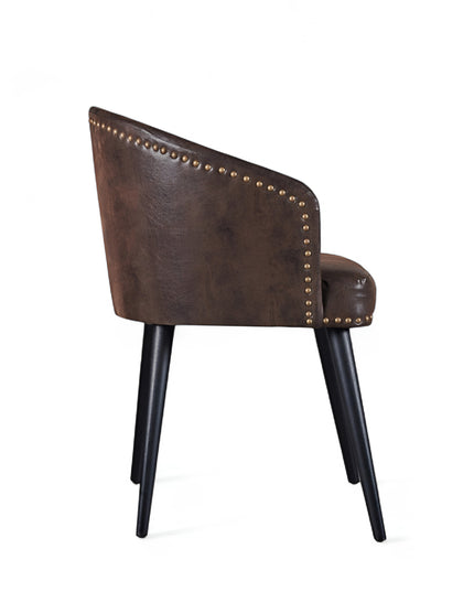 Curved barrel-back eco leather chair with nailhead trim and four tapered legs