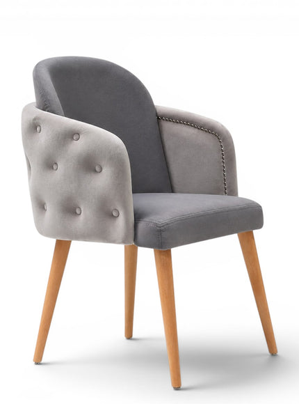 A modern gray upholstered dining chair with a tufted button backrest, nailhead trim, and tapered light wood legs, shown on a white background.