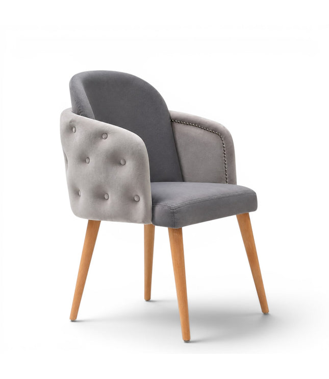 A modern gray upholstered dining chair with a tufted button backrest, nailhead trim, and tapered light wood legs, shown on a white background.