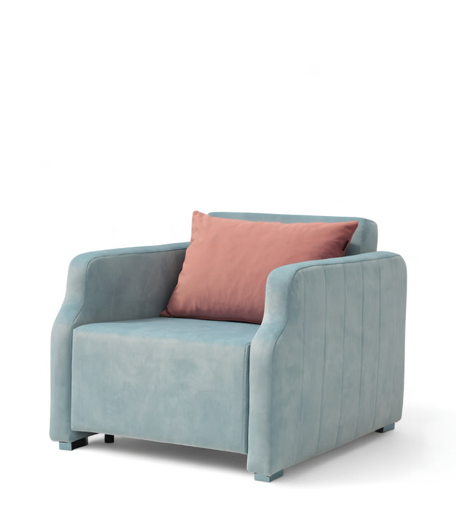 Contemporary blue lounge chair with a pull-out sleeper function and a soft pink accent pillow, featuring plush upholstery and modern lines—ideal for small spaces or guest rooms.