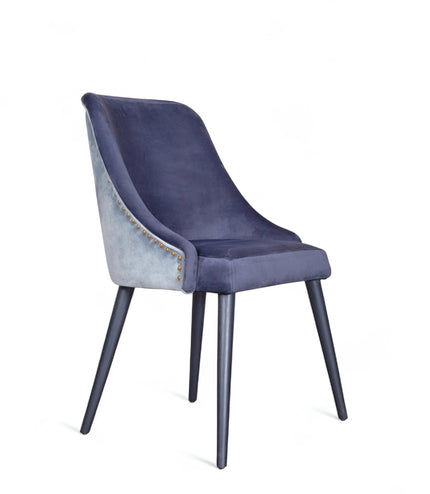 Contemporary side chair with two colors of blue curved backrest, studded trim, and black tapered legs