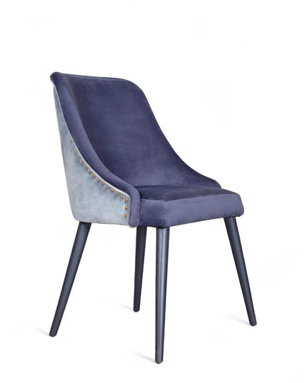 Contemporary side chair with two colors of blue curved backrest, studded trim, and black tapered legs