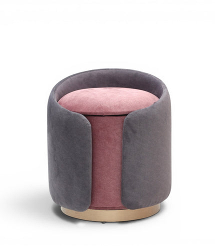 A cylindrical upholstered ottoman or stool in dusty grey velvet, featuring a light natural wood base, shown against a plain white background.