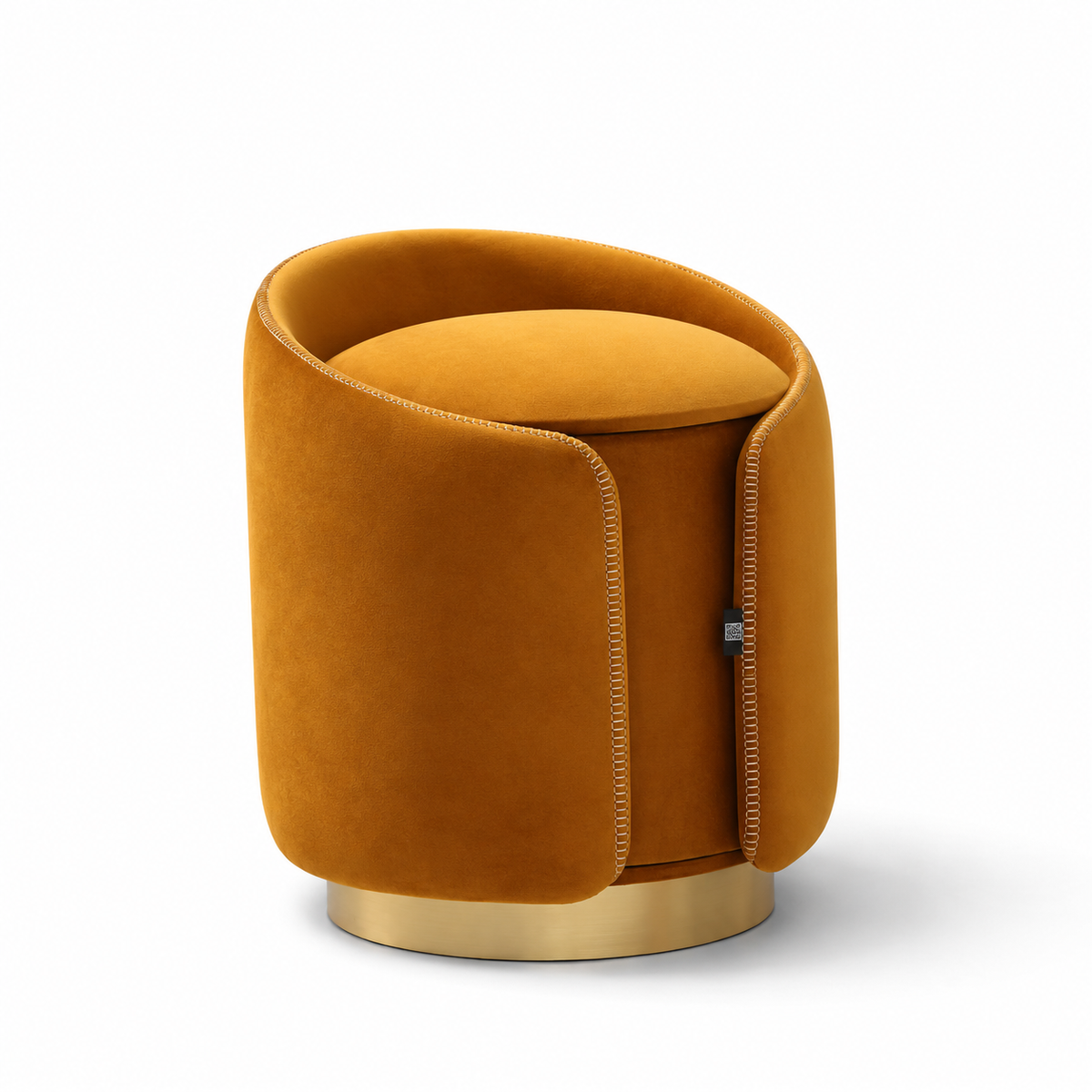 A modern cylindrical velvet ottoman or stool in mustard yellow with a gold metal base, shown on a clean white background.