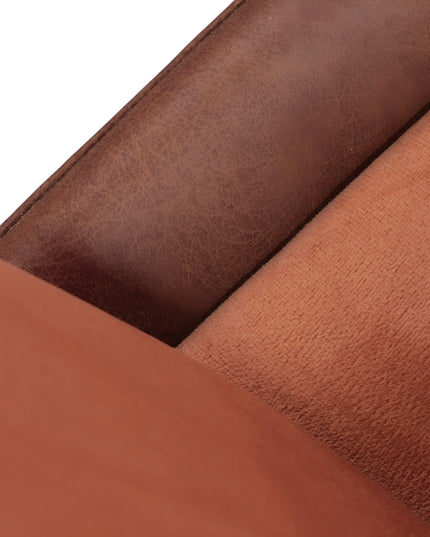 Modern terracotta velvet and leather accent chair with black metal legs — ideal for dining rooms, stylish interiors, or contemporary cafes seeking warmth and contrast.