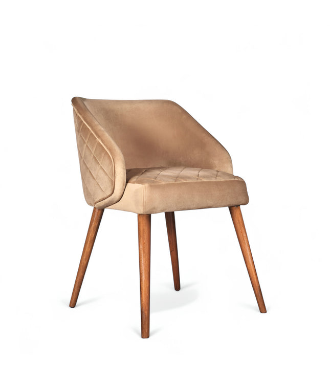 Modern quilted beige accent chair with wraparound back, low arms, and wooden tapered legs

