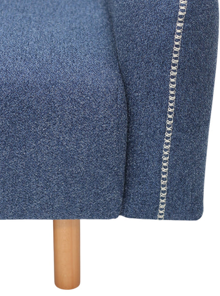 Close-up of a blue upholstered sofa with wooden leg on a white background