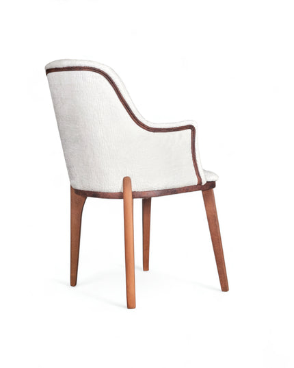Mid-century modern accent chair with a sculpted dark wood frame, white textured upholstery, and gently curved armrests, ideal for dining rooms or contemporary living spaces