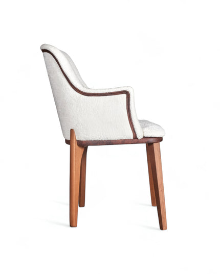 Mid-century modern accent chair with a sculpted dark wood frame, white textured upholstery, and gently curved armrests, ideal for dining rooms or contemporary living spaces