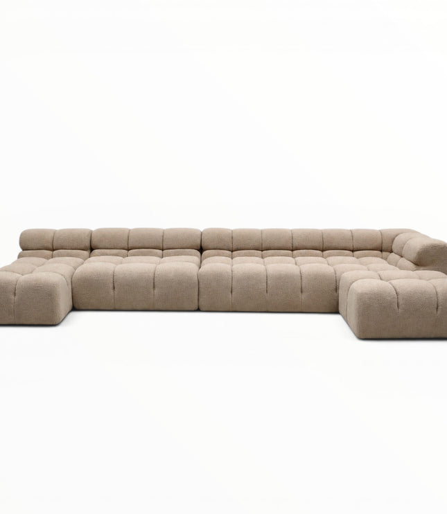 Beige sectional sofa on a white background