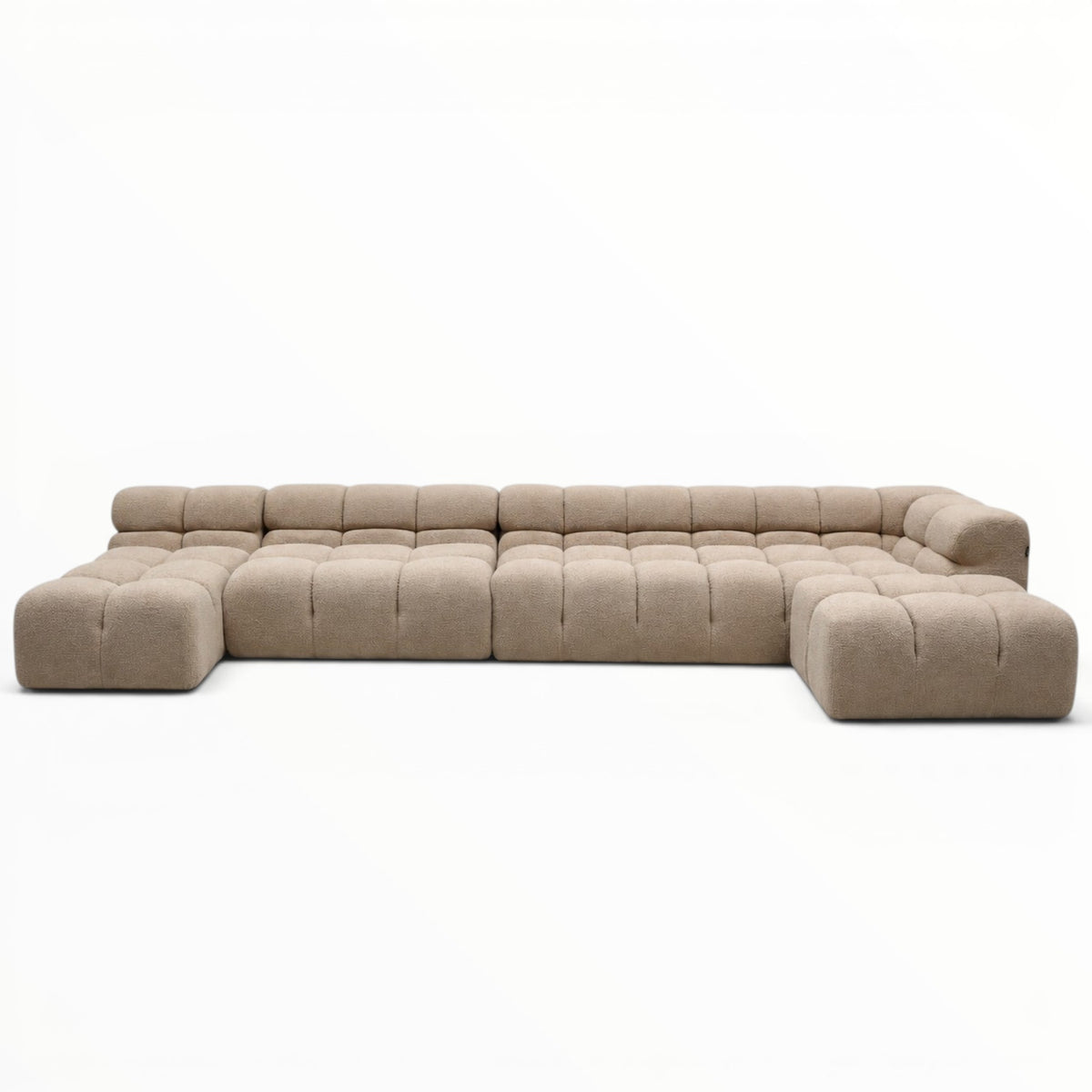 Beige sectional sofa on a white background