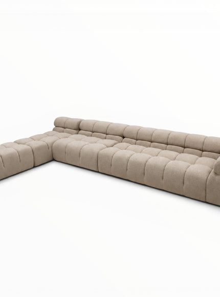 Beige sectional sofa on a white background
