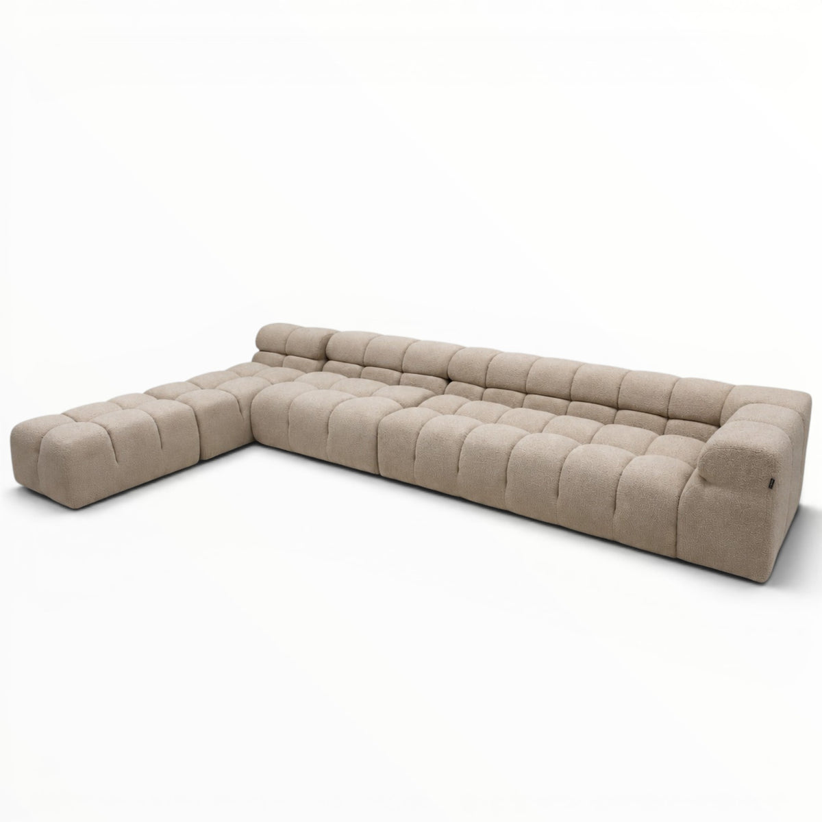 Beige sectional sofa on a white background