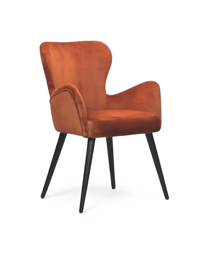 Mid-century modern burnt orange velvet accent chair with black metal legs, ideal for living room or office decor.