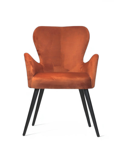 Mid-century modern burnt orange velvet accent chair with black metal legs, ideal for living room or office decor.