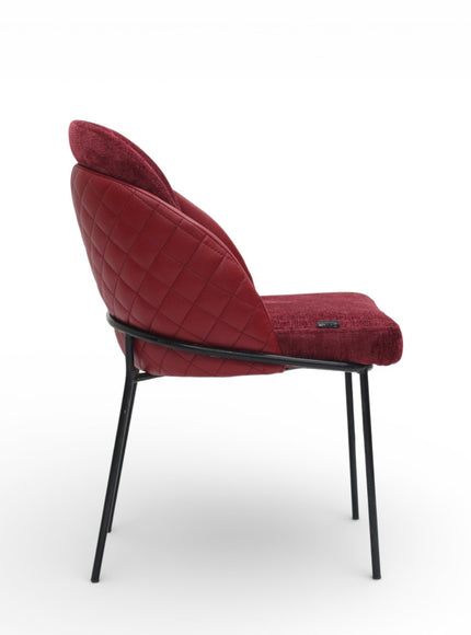 Red upholstered chair with black metal legs on a white background