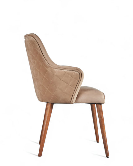 Beige upholstered armchair with high back, quilted sides, and wooden legs in a mid-century modern style