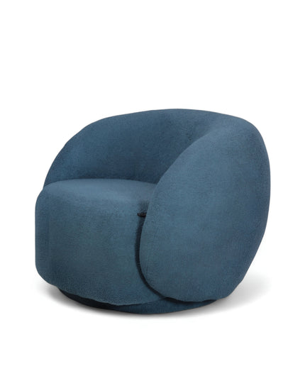 Deep blue boucle Cloud Armchair with a rounded, armless design and swivel base, offering a plush, sculptural look from front and angled views.