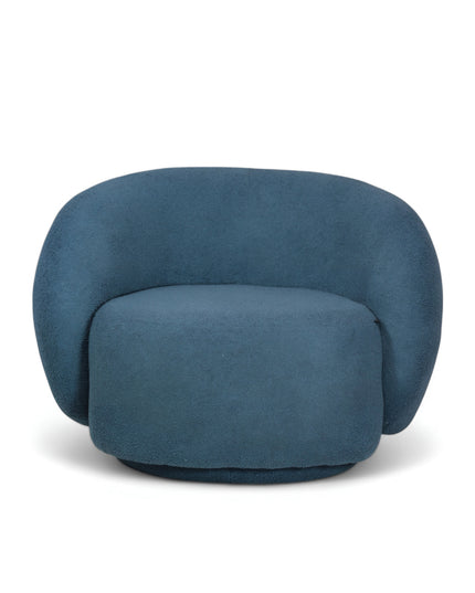 Deep blue boucle Cloud Armchair with a rounded, armless design and swivel base, offering a plush, sculptural look from front and angled views.