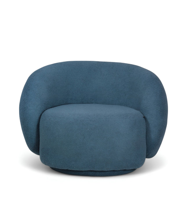 Deep blue boucle Cloud Armchair with a rounded, armless design and swivel base, offering a plush, sculptural look from front and angled views.