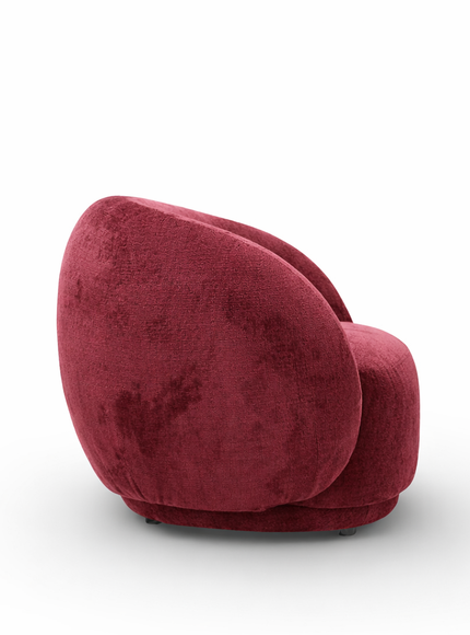 Raspberry embossed Cloud Armchair with a rounded, armless design and swivel base, offering a plush, sculptural look from front and angled views.