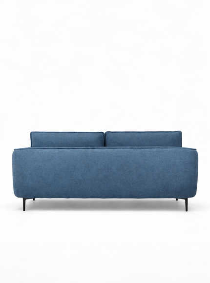 Cobalt Sofa in boucle-style blue fabric with slim black metal legs, rounded arms, and two patterned accent pillows, shown from front view and close-up fabric detail.
