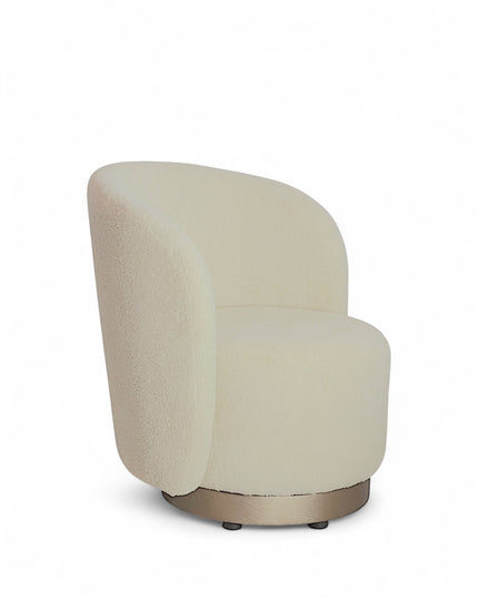 Modern boucle swivel lounge chair with off-white upholstery, curved backrest, and brass base by Vaya Home—ideal for contemporary living room or bedroom seating.
