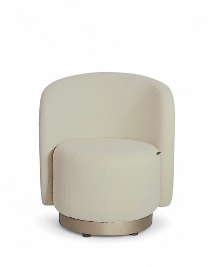 Modern boucle swivel lounge chair with off-white upholstery, curved backrest, and brass base by Vaya Home—ideal for contemporary living room or bedroom seating.
