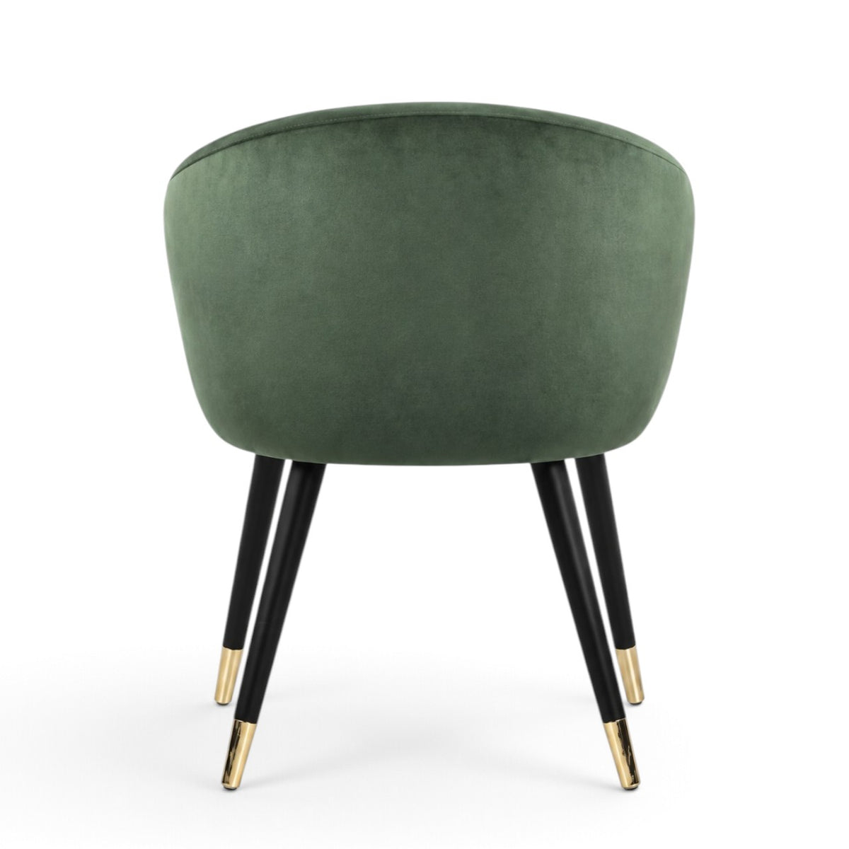 A green velvet barrel-style accent chair with black tapered legs and gold metal tips, shown against a plain white background.