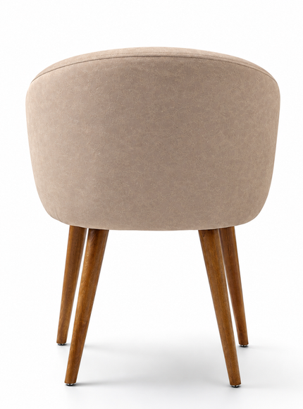 A modern barrel-style accent chair upholstered in a textured beige velvet fabric with a curved backrest and pleated detailing, supported by four tapered medium-brown wooden legs, shown on a clean white background.