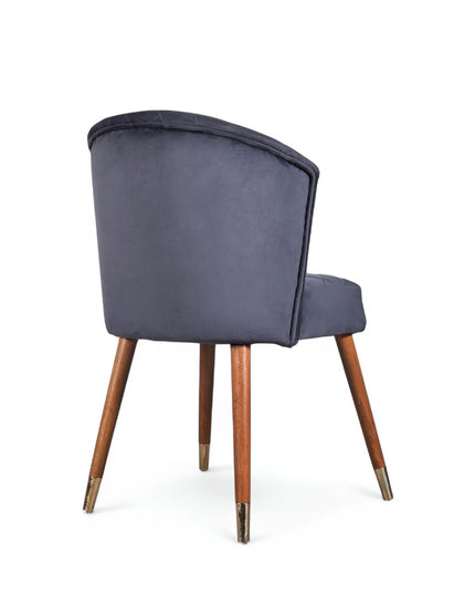 Elevate your interior with this diamond-stitched accent chair featuring a dark blue curved back, wooden legs, and gold-tone accents—ideal for dining or vanity spaces.