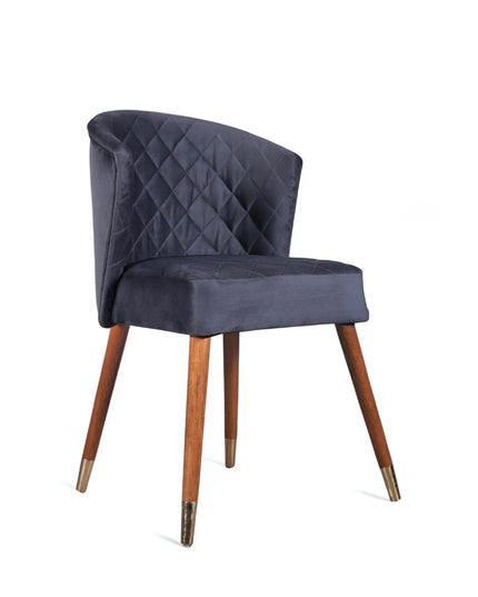 Elevate your interior with this diamond-stitched accent chair featuring a dark blue curved back, wooden legs, and gold-tone accents—ideal for dining or vanity spaces.