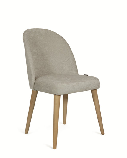 Contemporary beige chair with rounded backrest, cushioned seat, and tapered wooden legs