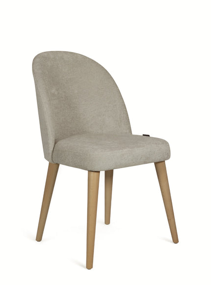 Contemporary beige chair with rounded backrest, cushioned seat, and tapered wooden legs