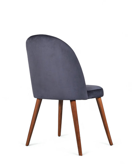 Contemporary dark blue chair with rounded backrest, cushioned seat, and tapered wooden legs