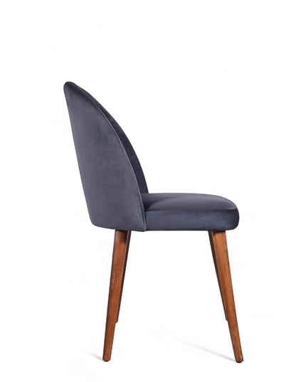 Contemporary dark blue chair with rounded backrest, cushioned seat, and tapered wooden legs