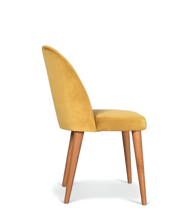 Contemporary yellow chair with rounded backrest, cushioned seat, and tapered wooden legs