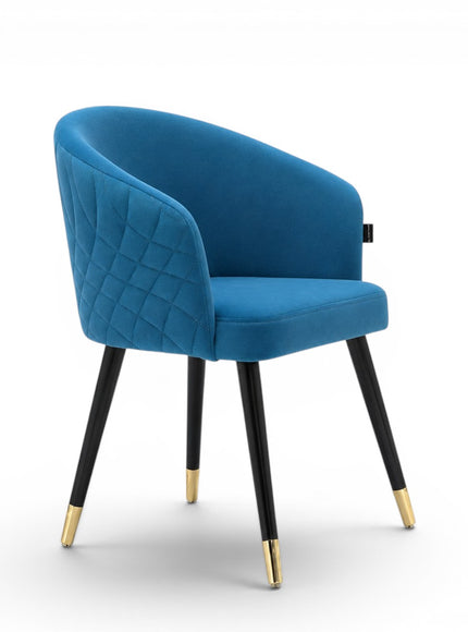 Blue armchair with black legs and gold tips on a white background