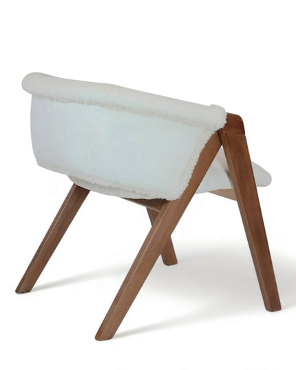 Modern white boucle accent chair with solid wood frame and angular legs — ideal for cozy interiors, Scandinavian spaces, or contemporary dining rooms. 