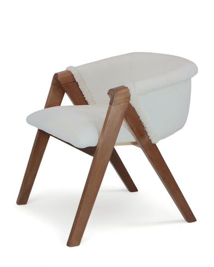 Modern white boucle accent chair with solid wood frame and angular legs — ideal for cozy interiors, Scandinavian spaces, or contemporary dining rooms. 