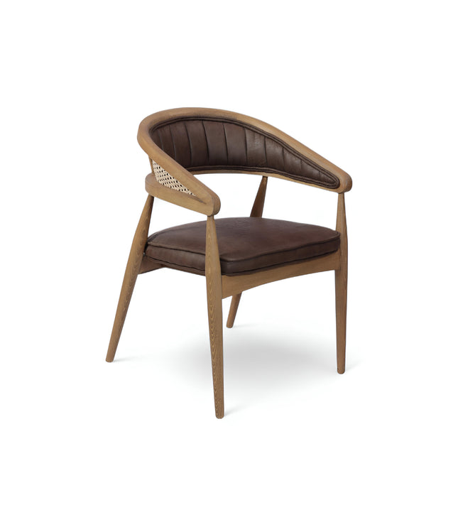  Mid-century modern accent chair with curved oak frame, woven cane side panels, and dark brown faux leather upholstery, ideal for dining rooms or stylish home offices.