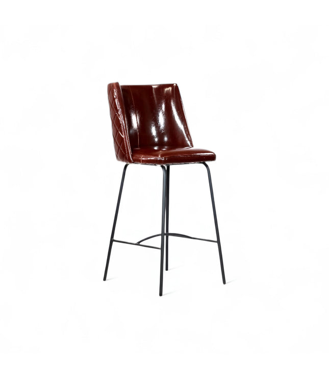 Modern bar stool with glossy dark brown faux leather upholstery, quilted side detailing, and slender black metal legs with a footrest, ideal for kitchen islands or contemporary home bars