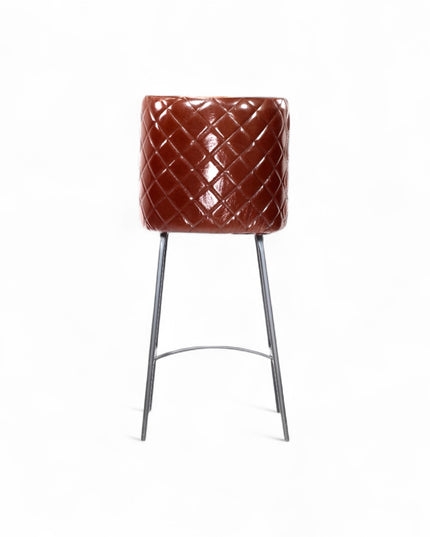 Modern bar stool with glossy dark brown faux leather upholstery, quilted side detailing, and slender black metal legs with a footrest, ideal for kitchen islands or contemporary home bars